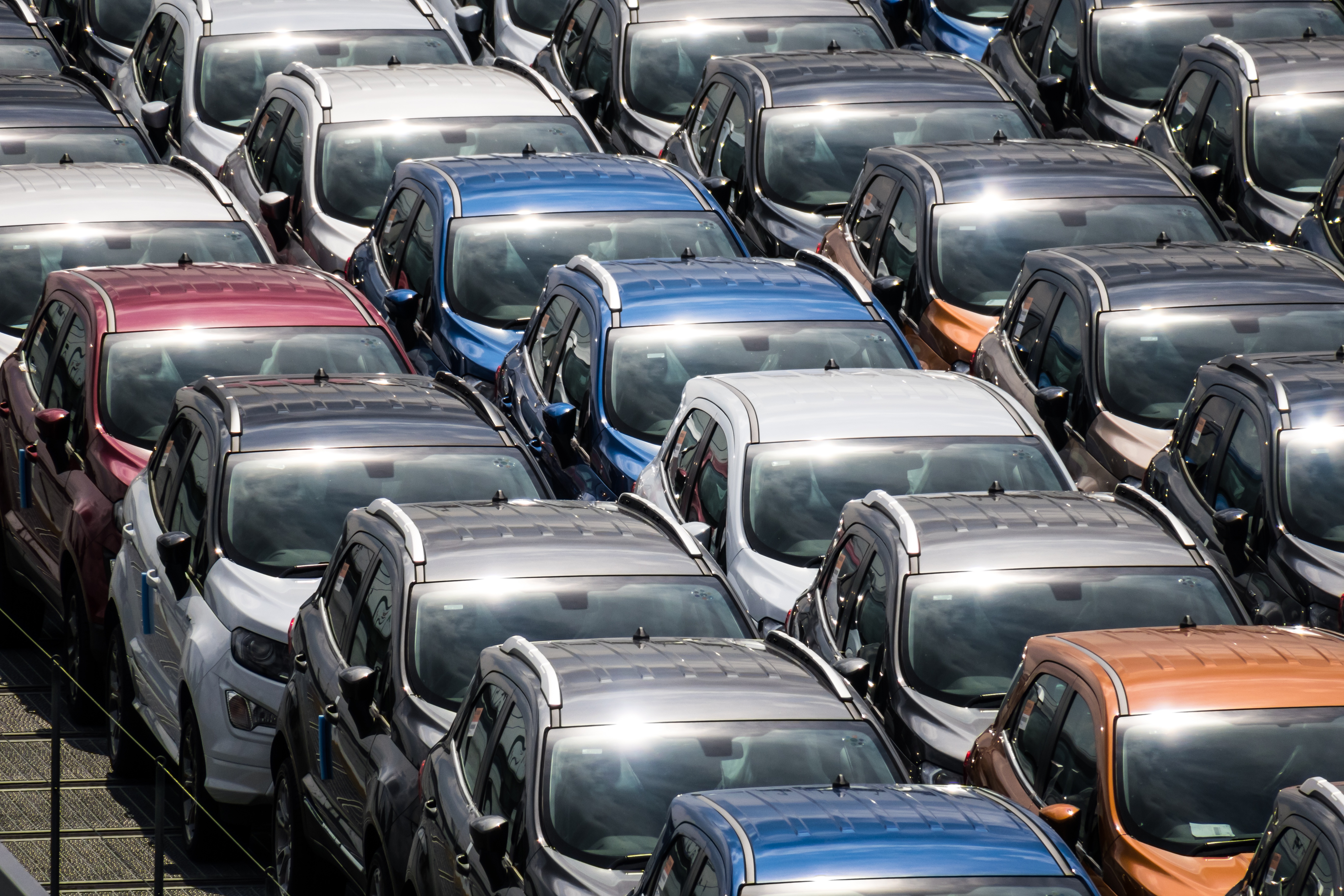 New cars lined up for transport